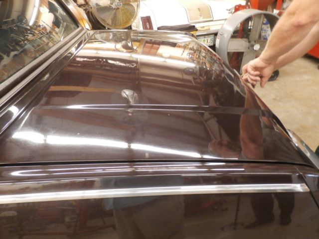 1985 unknown, dark maroon? Oldsmobile Toronado Coupe