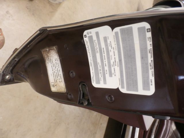 1985 unknown, dark maroon? Oldsmobile Toronado Coupe