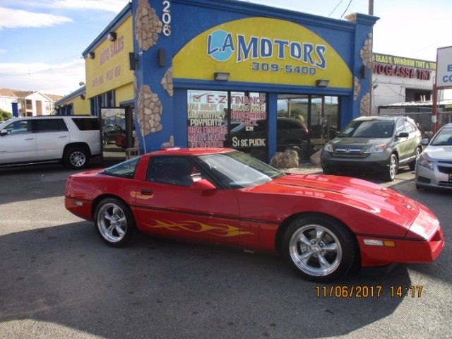 1989 red Chevrolet Corvette Coupe