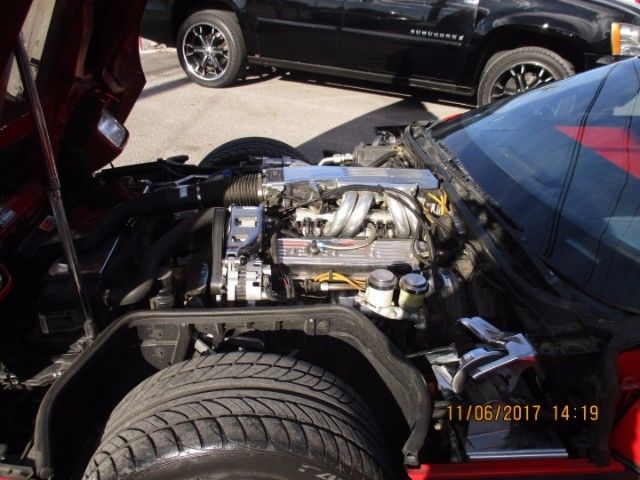 1989 red Chevrolet Corvette Coupe