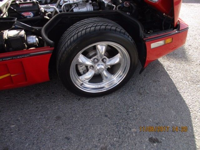 1989 red Chevrolet Corvette Coupe