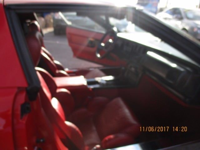 1989 red Chevrolet Corvette Coupe