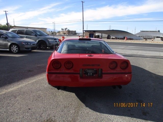 1989 red Chevrolet Corvette Coupe