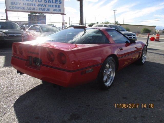 1989 red Chevrolet Corvette Coupe
