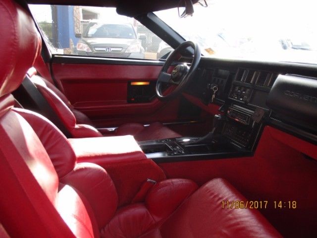 1989 red Chevrolet Corvette Coupe