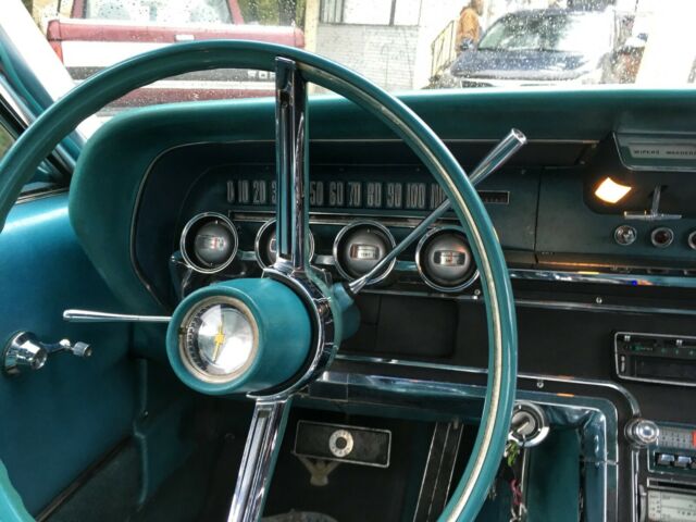 1965 White Ford Thunderbird