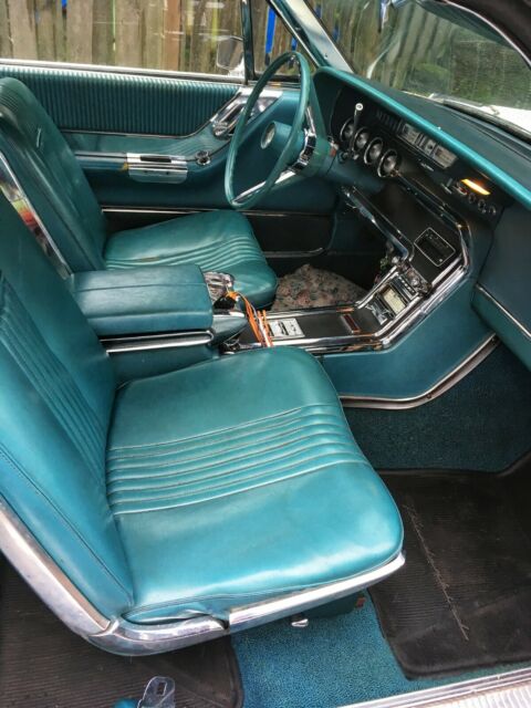 1965 White Ford Thunderbird