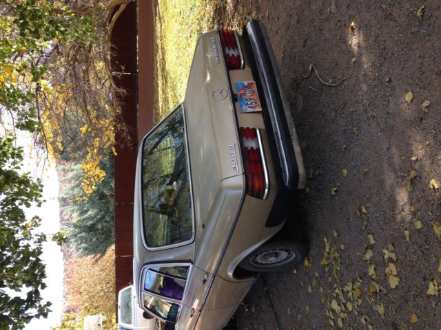 1984 Gold Mercedes-Benz 300-Series Sedan