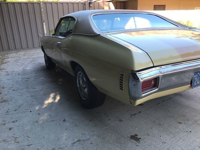 1970 light yellow Chevrolet Malibu Coupe