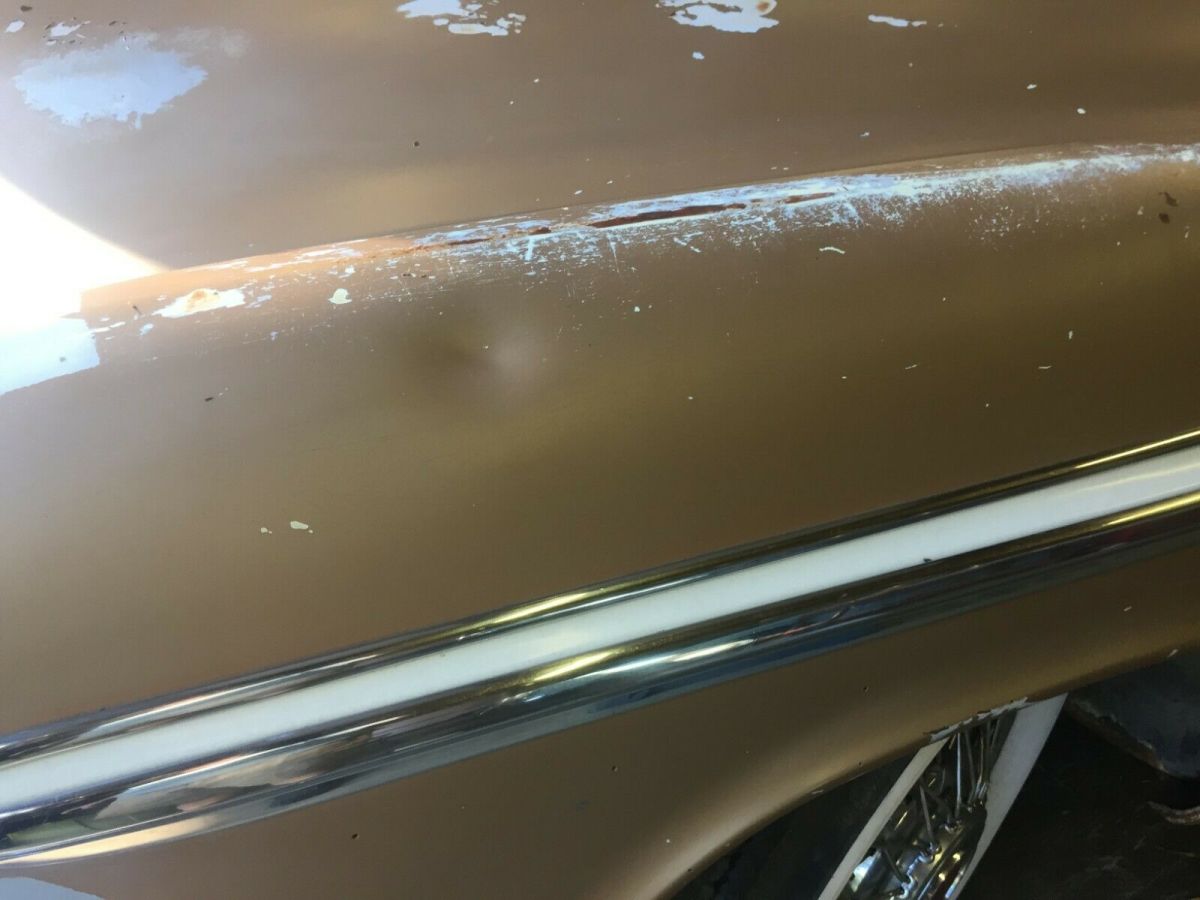 1956 Gold Chrysler New Yorker Coupe