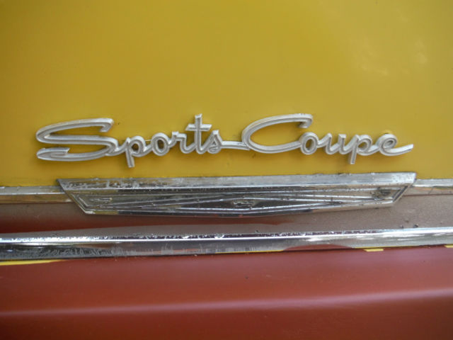 1965 Yellow Ford Fairlane two door hart top