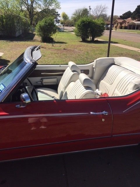 1972 red Oldsmobile Cutlass Convertible