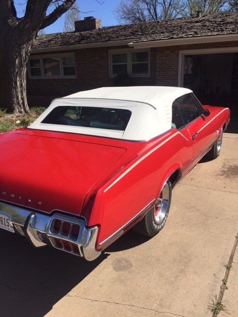 1972 red Oldsmobile Cutlass Convertible