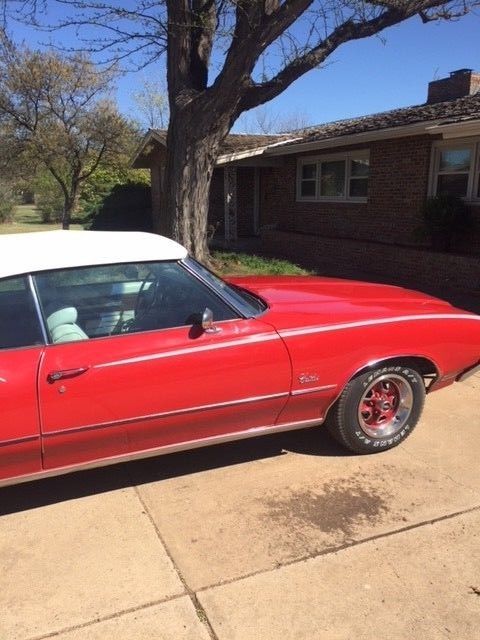 1972 red Oldsmobile Cutlass Convertible