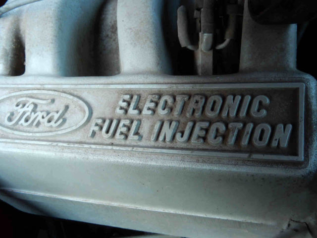 1970 Red with silver trim Ford F-100 Standard Cab Pickup