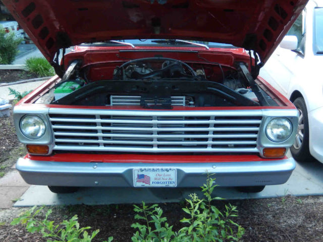 1970 Red with silver trim Ford F-100 Standard Cab Pickup