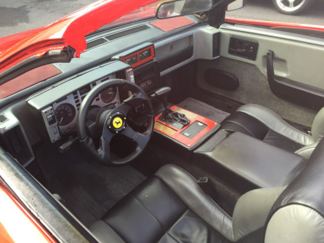 1986 Red Pontiac Fiero Convertible