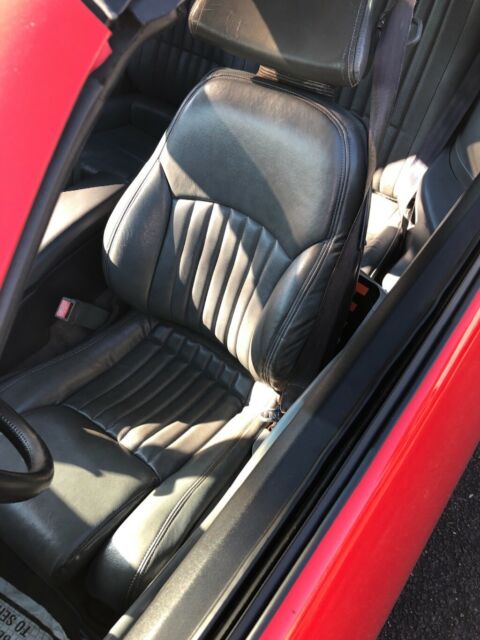 1989 Red Pontiac Firebird Fastback