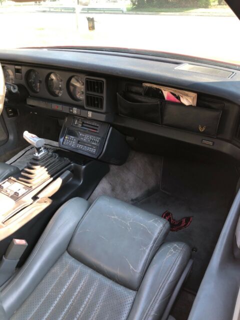 1989 Red Pontiac Firebird Fastback