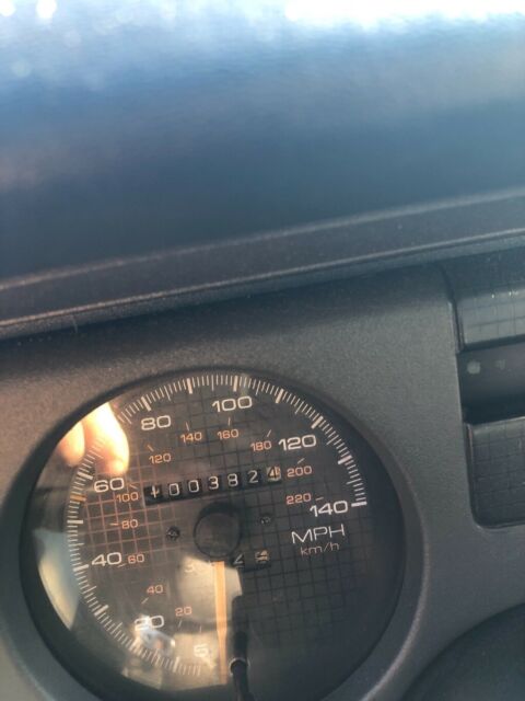 1989 Red Pontiac Firebird Fastback