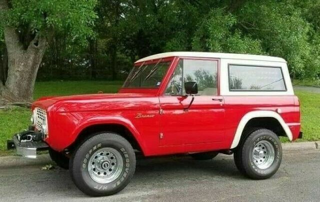 1966 White over red Ford Bronco SUV