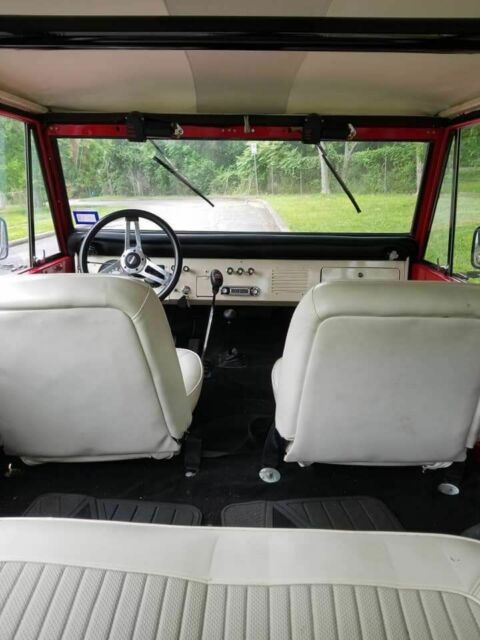 1966 White over red Ford Bronco SUV