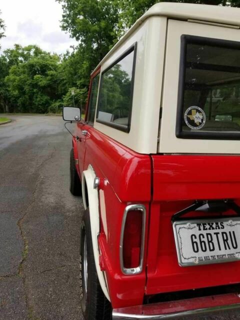 1966 White over red Ford Bronco SUV