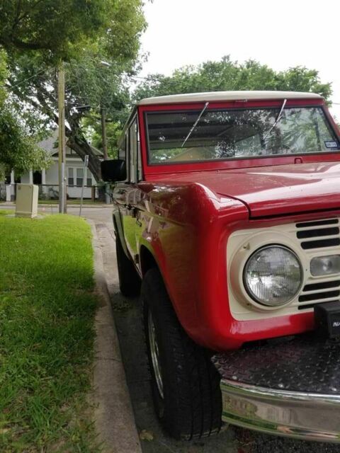 1966 White over red Ford Bronco SUV