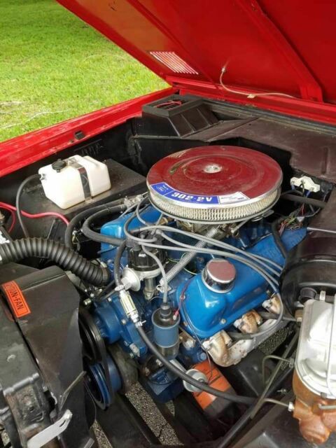 1966 White over red Ford Bronco SUV