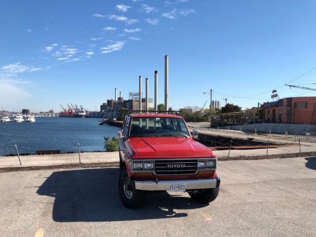 1990 Red Toyota Land Cruiser SUV