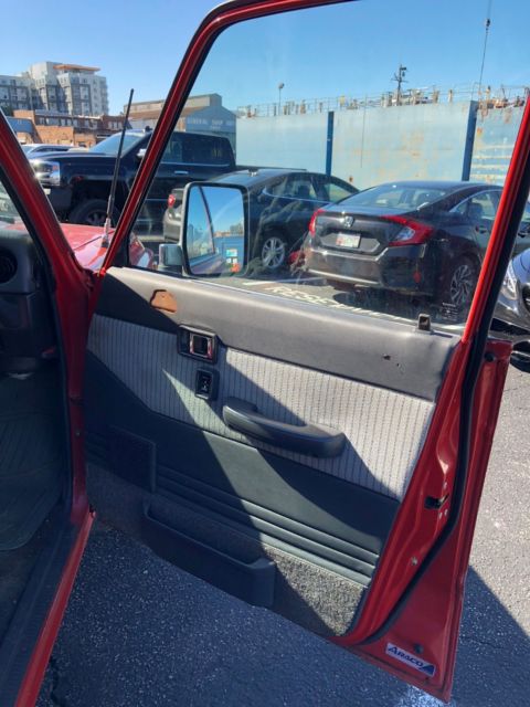 1990 Red Toyota Land Cruiser SUV