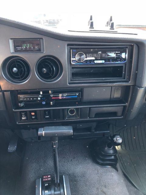 1990 Red Toyota Land Cruiser SUV