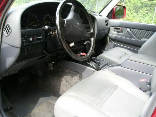 1994 Medium Red Pearl Toyota Land Cruiser SUV