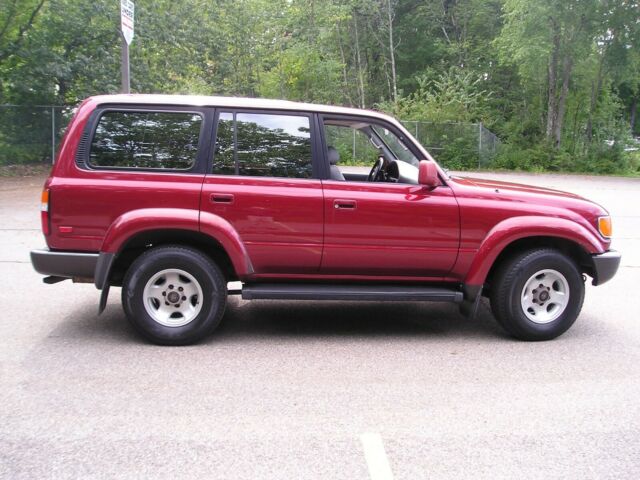 1994 Medium Red Pearl Toyota Land Cruiser SUV