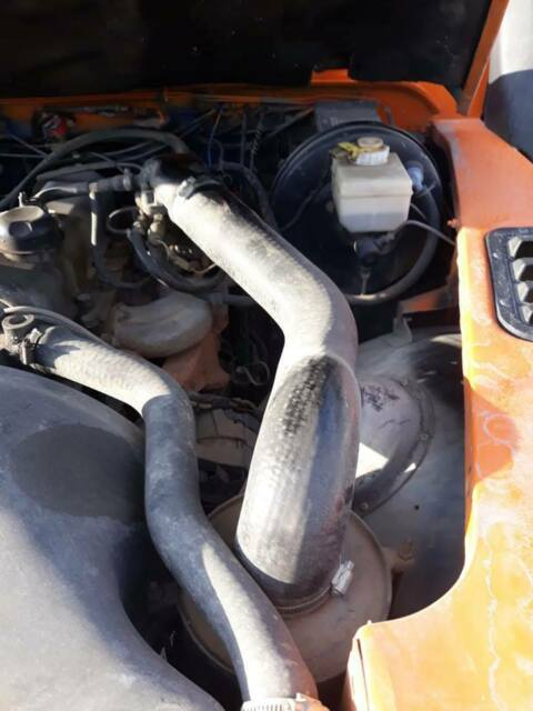 1993 Orange Land Rover Defender