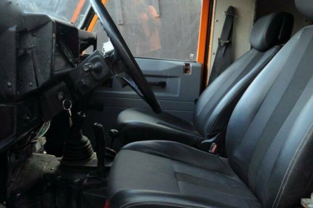 1993 Orange Land Rover Defender