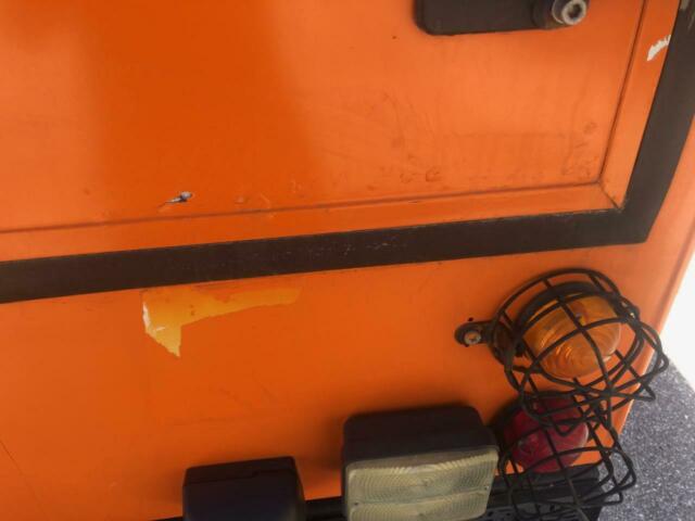 1993 Orange Land Rover Defender