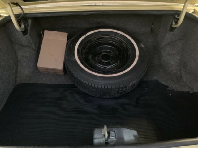 1980 Yellow Cadillac Brougham Sedan