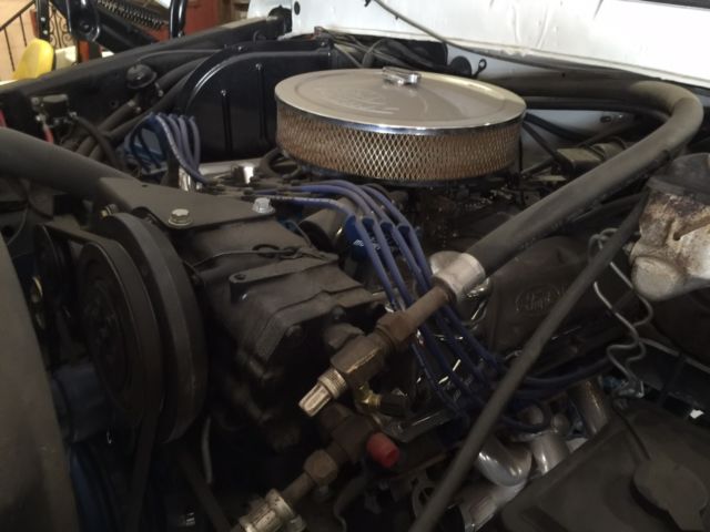 1979 white Ford F-250 Standard Cab Pickup