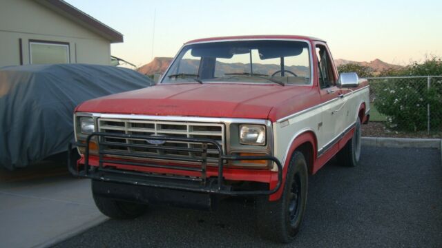 1985 Red Ford F-150 Standard Cab Pickup
