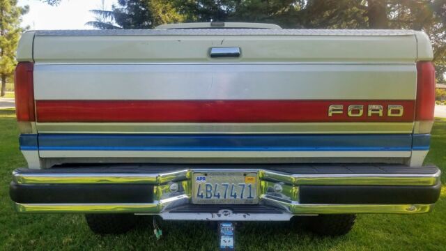 1990 White with Blue stripe - two tone Ford F-250 Extended Cab Pickup