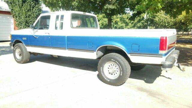 1990 White with Blue stripe - two tone Ford F-250 Extended Cab Pickup