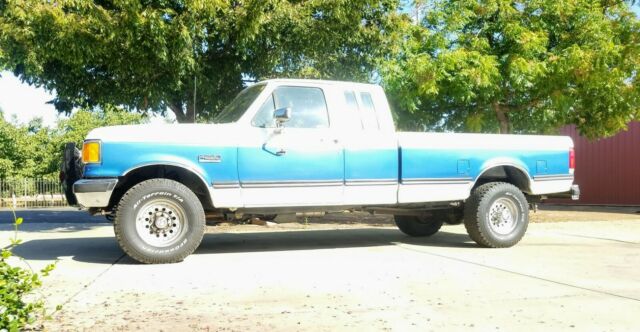 1990 White with Blue stripe - two tone Ford F-250 Extended Cab Pickup