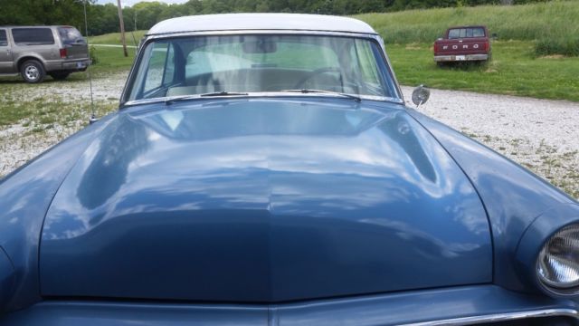 1954 and cream Ford Other HT.