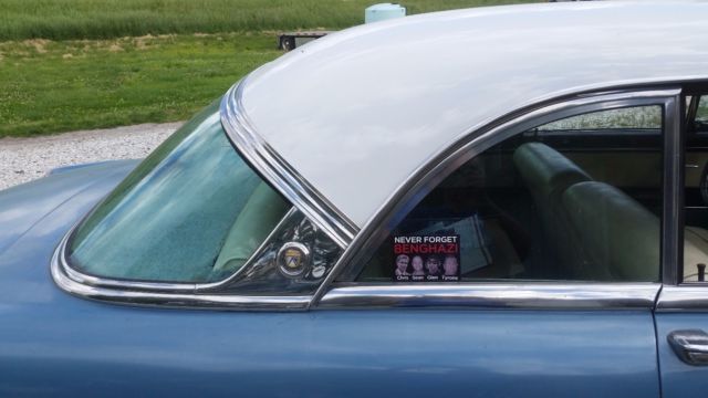 1954 and cream Ford Other HT.