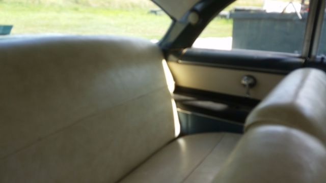 1954 and cream Ford Other HT.
