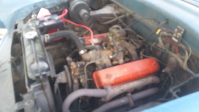 1954 and cream Ford Other HT.