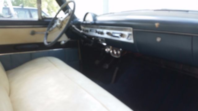 1954 and cream Ford Other HT.