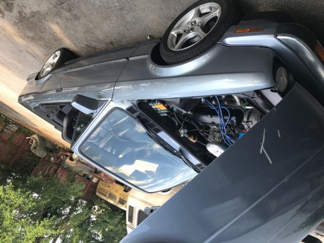 1988 blue/silver BMW 3-Series Convertible