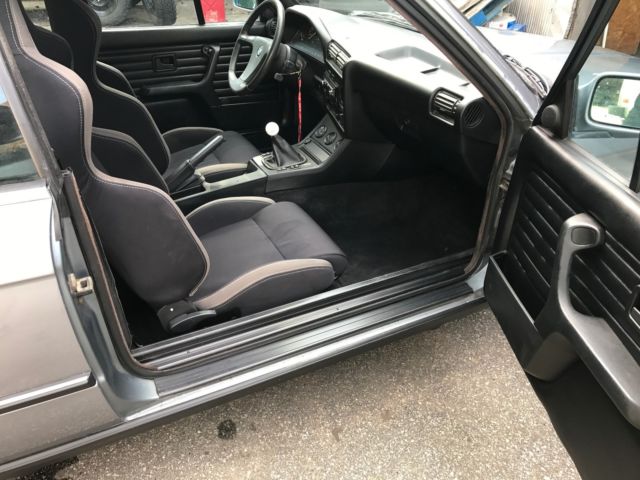 1988 blue/silver BMW 3-Series Convertible